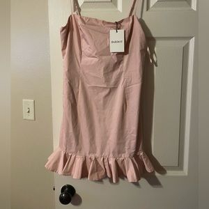 pink tight dress, could be formal or more casual.